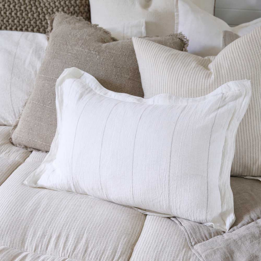 Modern and classic with its double linen flange edge, this striped cushion will add a stylish finish to your sofa or bed.