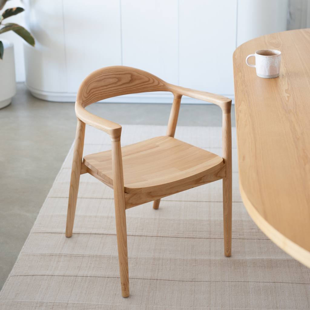 Curved wooden dining chair