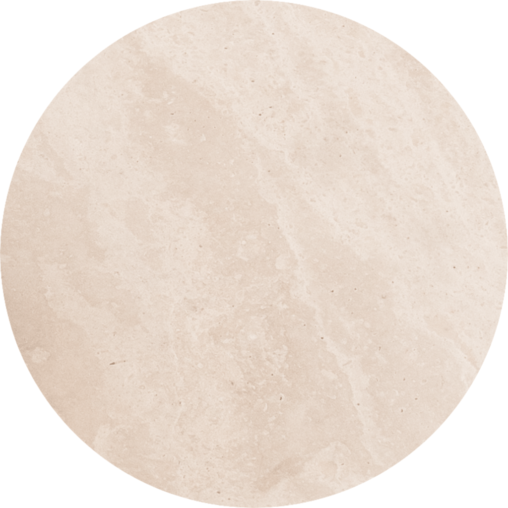 Close‑up of Roquette Side Table honed matte white travertine veining.