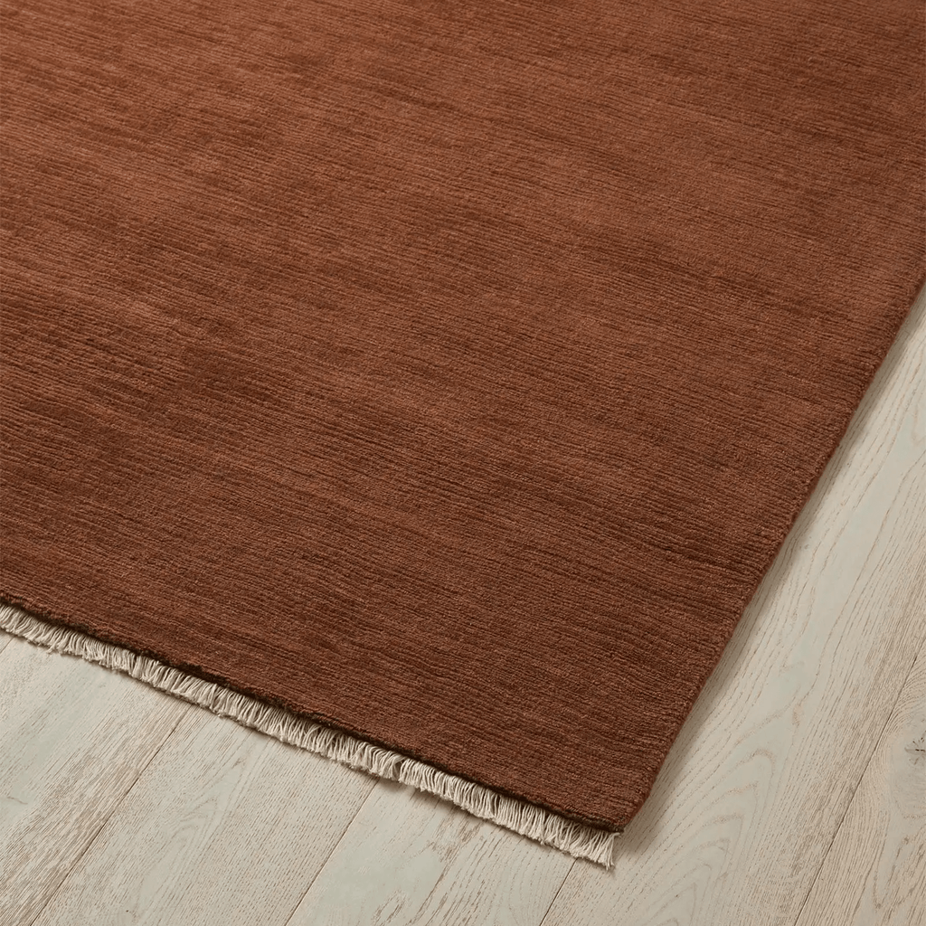 Weave Home Alessandre Rug in earthy Clay tone showcasing textured weave and sophisticated design