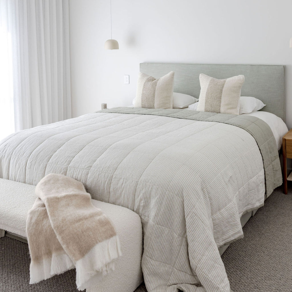 Coco Linen Blanket Sage on queen bed and Stripe