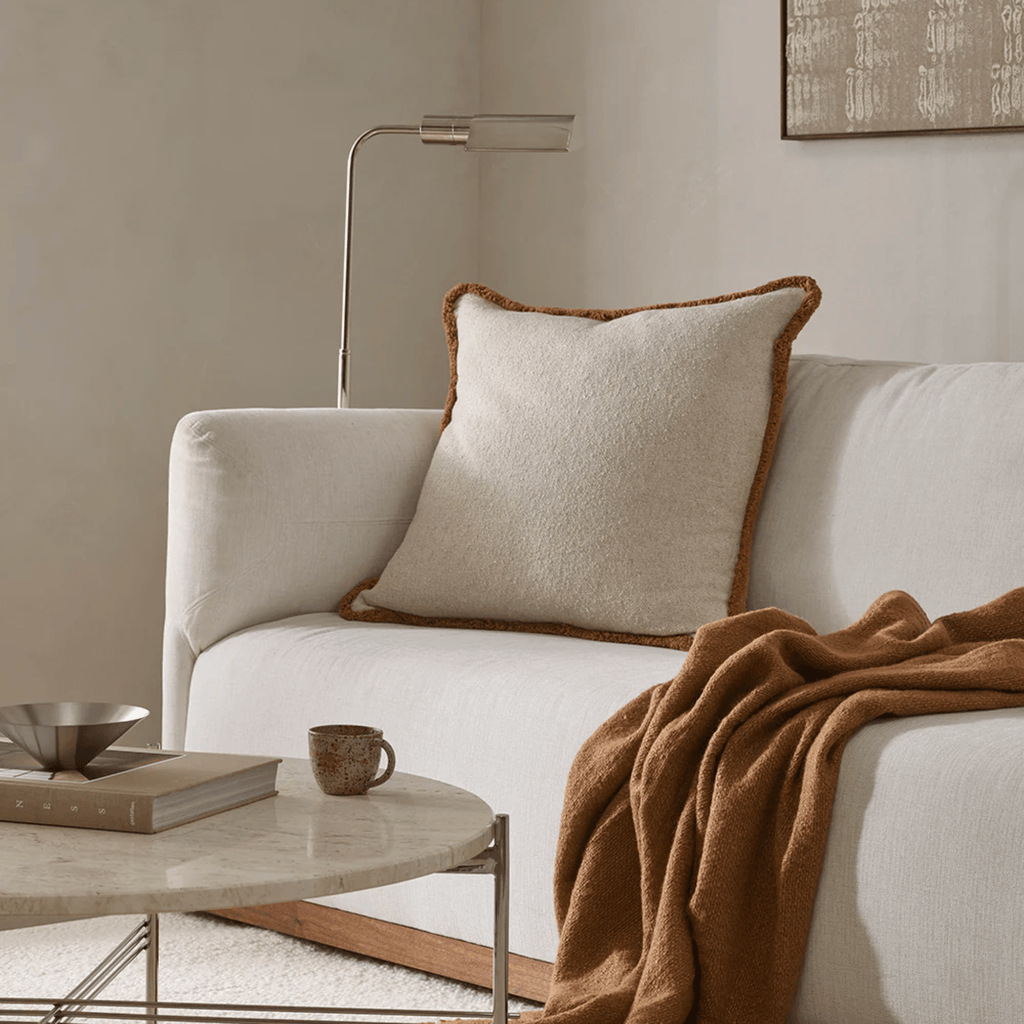 “Baya Darcy Sienna Cushion in warm sienna tones