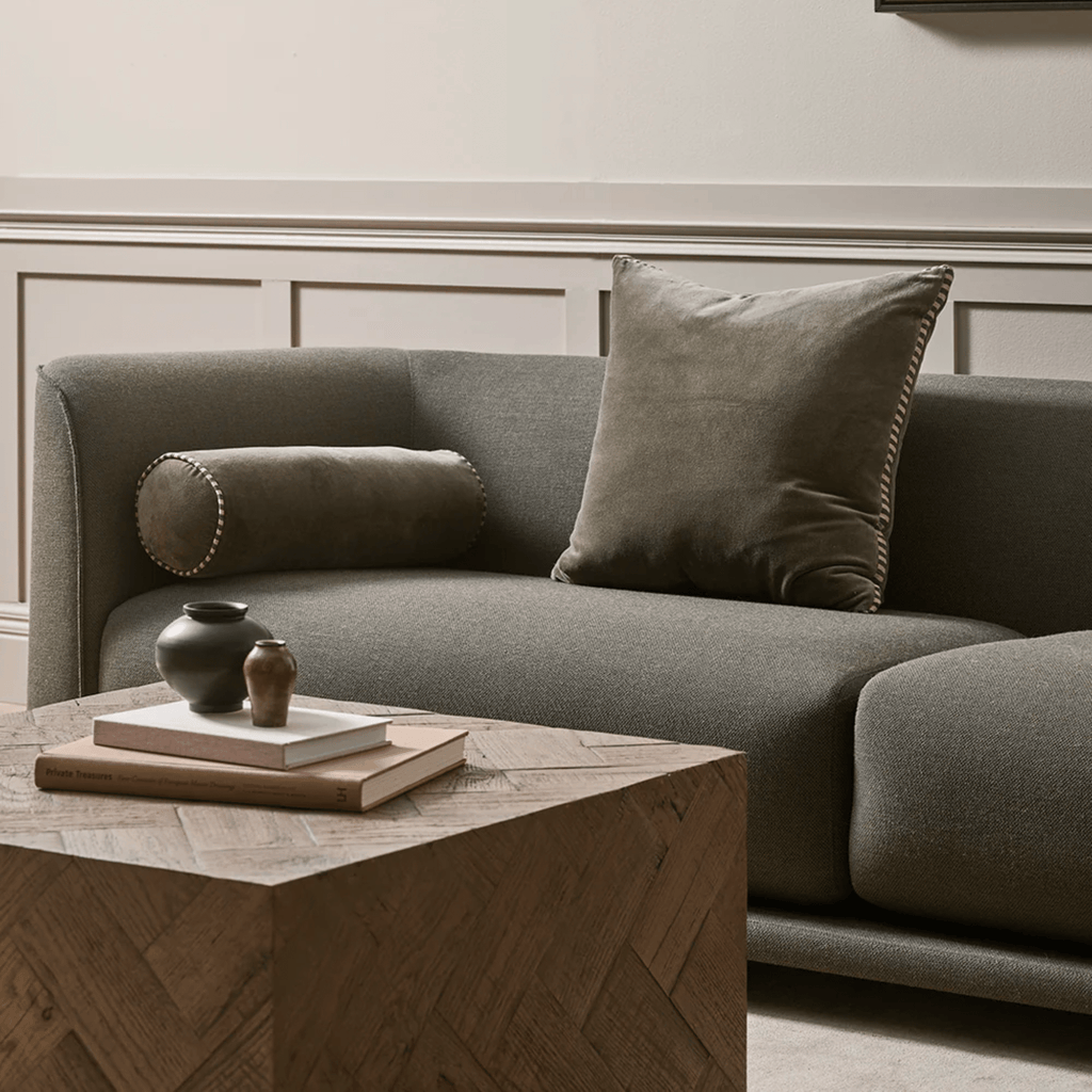 Elliot Thyme Bolster Cushion by Baya styled in living room