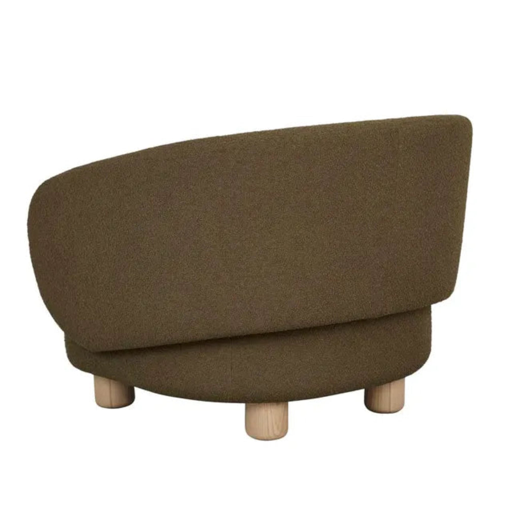 Designer occasional chair in deep olive upholstery, featuring natural ash wood legs and contemporary curved styling