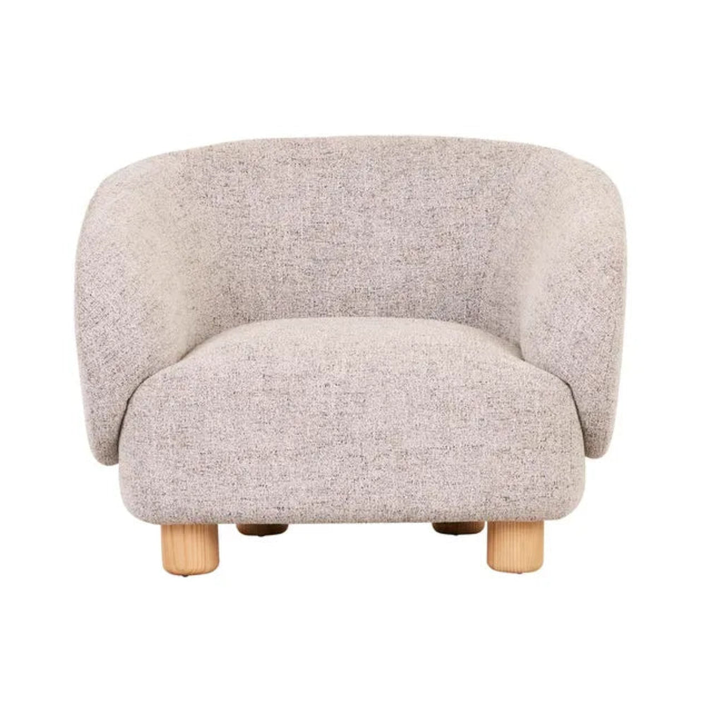 Flo Occasional Chair featuring moon rock textured upholstery and natural ash timber legs with curved barrel design.