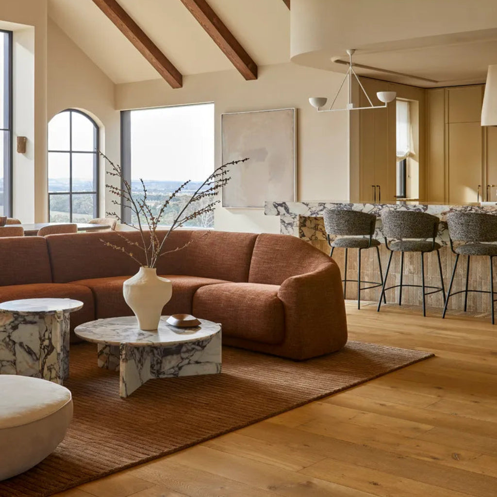 Globewest Forme Rina Vase White styled with dried stems on console in minimalist interior