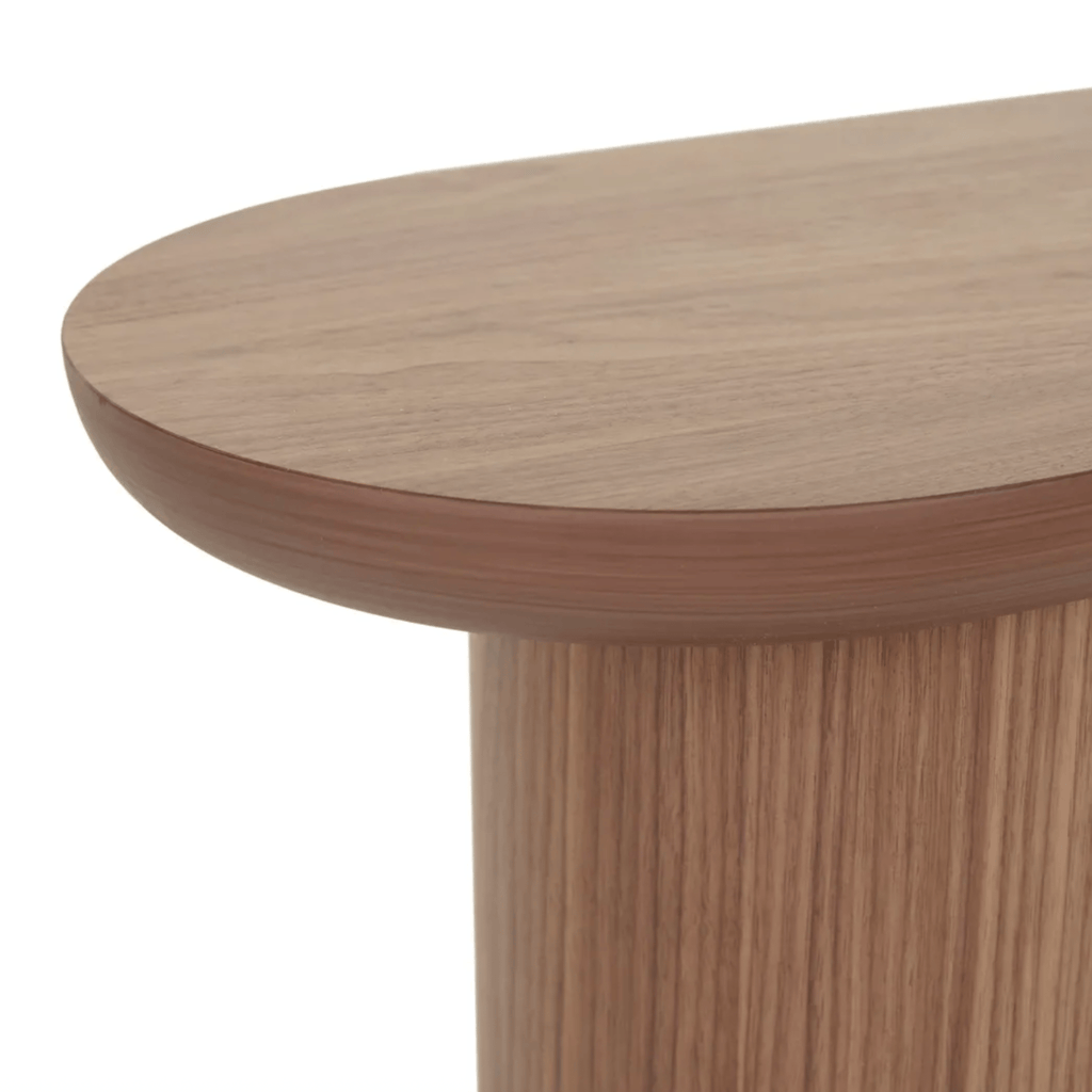 detail image of the Seb Pedestal Side Table in walnut wood finish with curved base
