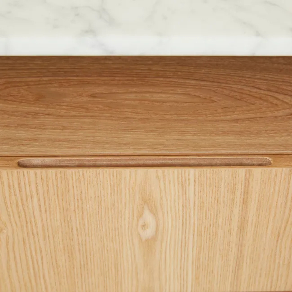 Elegant modern bedside with dual drawers, marble top, and ash veneer finish for a clean and refined bedroom look