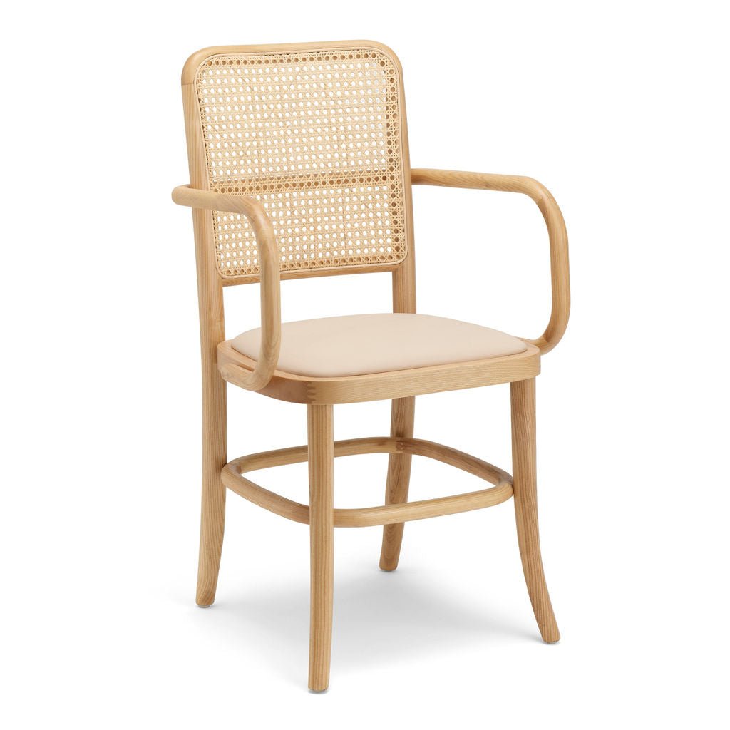 Comfortable Lacie Dining Chair featuring high back, arm support, vegan leather and ash wood
