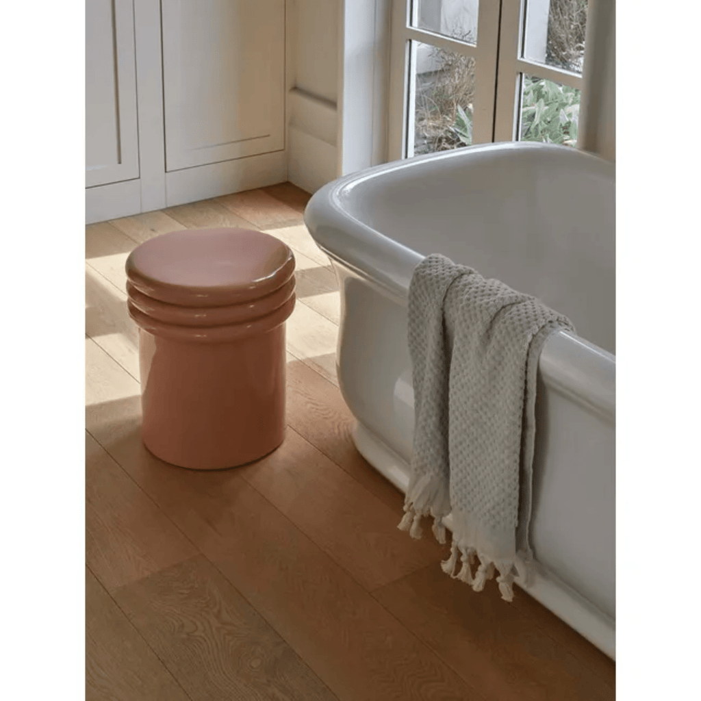 GlobeWest Hanson Round Side Table styled in coastal bathroom