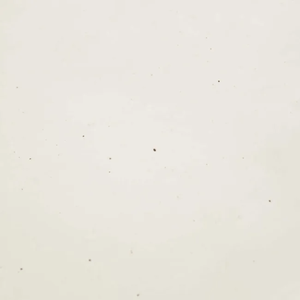 GlobeWest Hanson Round Side Table White Speckle close-up speckled glaze.