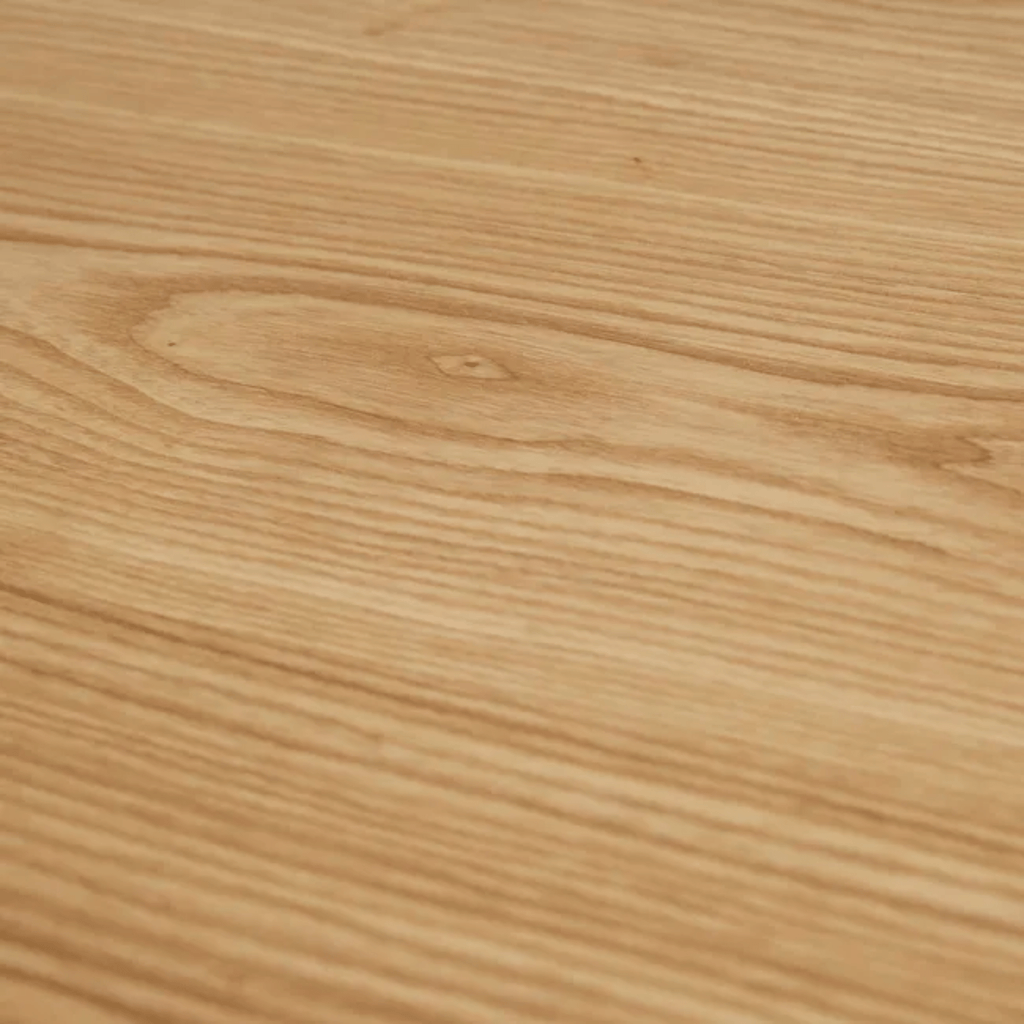 Close-up of Leon Dining Table Natural Ash surface with visible grain and texture