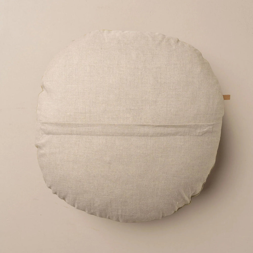 Reverse side of Saarde Linen Velvet Round Cushion in stone colour for modern interiors.