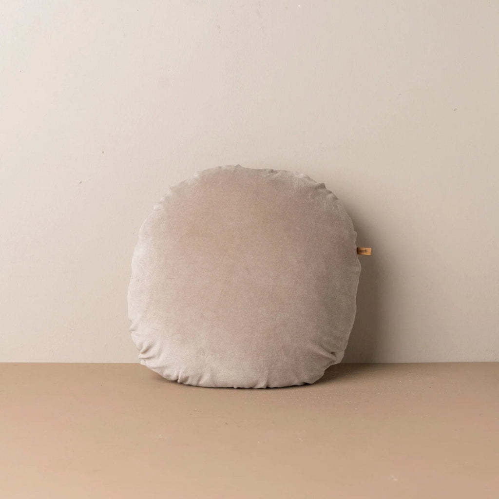 Saarde Linen Velvet Round Cushion in stone colour for modern interiors.
