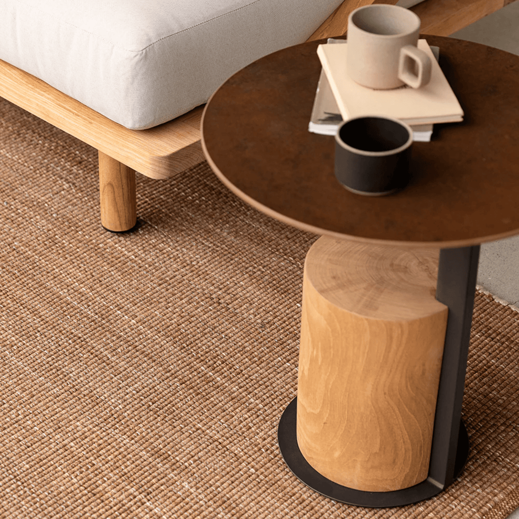 Lonsdale Indoor Outdoor Rug showcased in contemporary covered outdoor living area