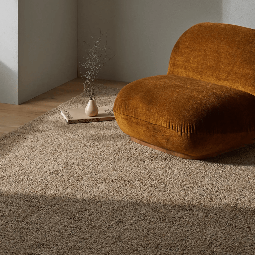 Weave Home Marceau Rug in Taupe - lifestyle shot styled in elegant living space with warm décor.