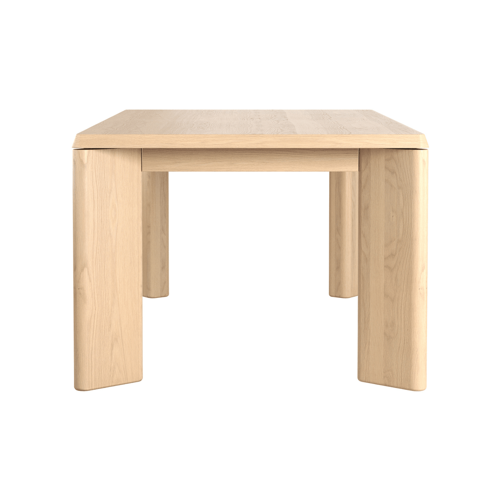 Close‑up side view of Lenny Dining Table oak crema tabletop and leg detail.
