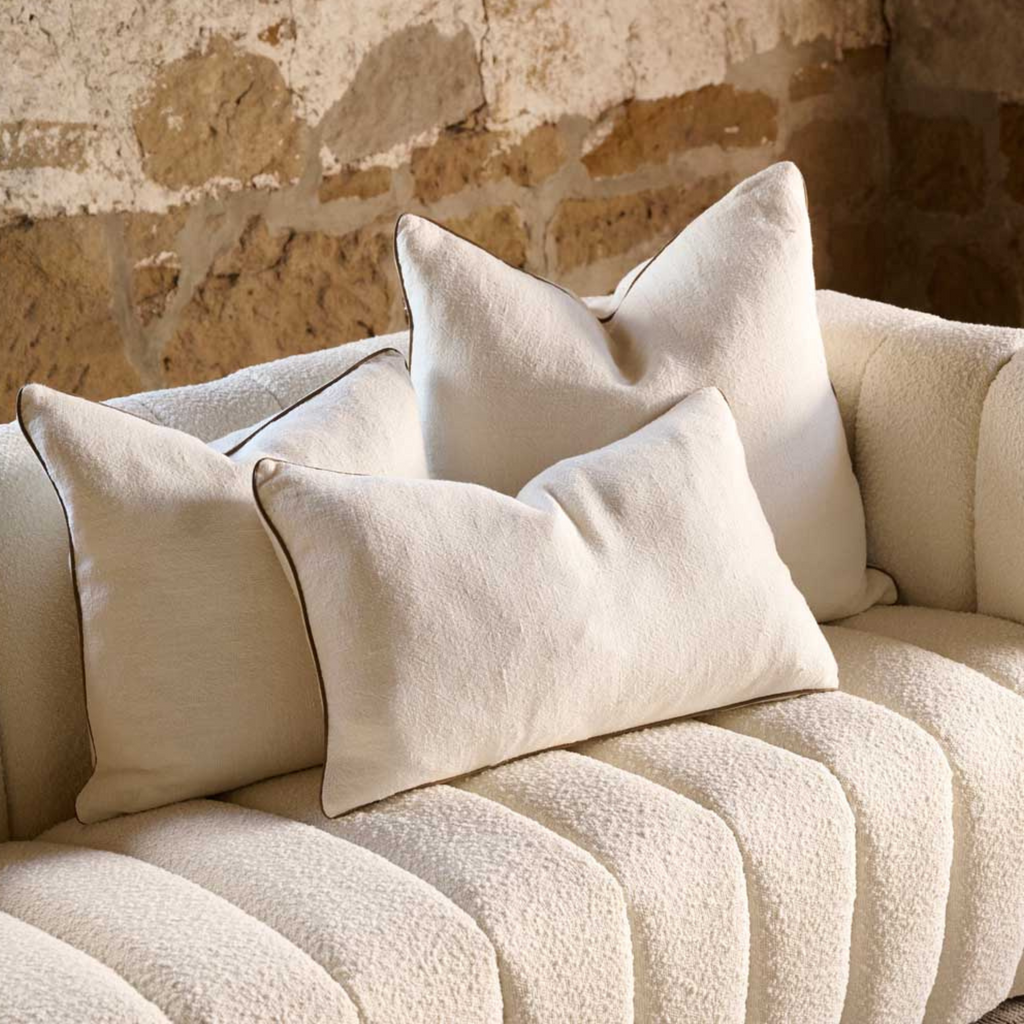 The Muse cushion is crafted from a luxe, heavy weight linen with a refined leather piping, and Eadie's signature cushion infill. 