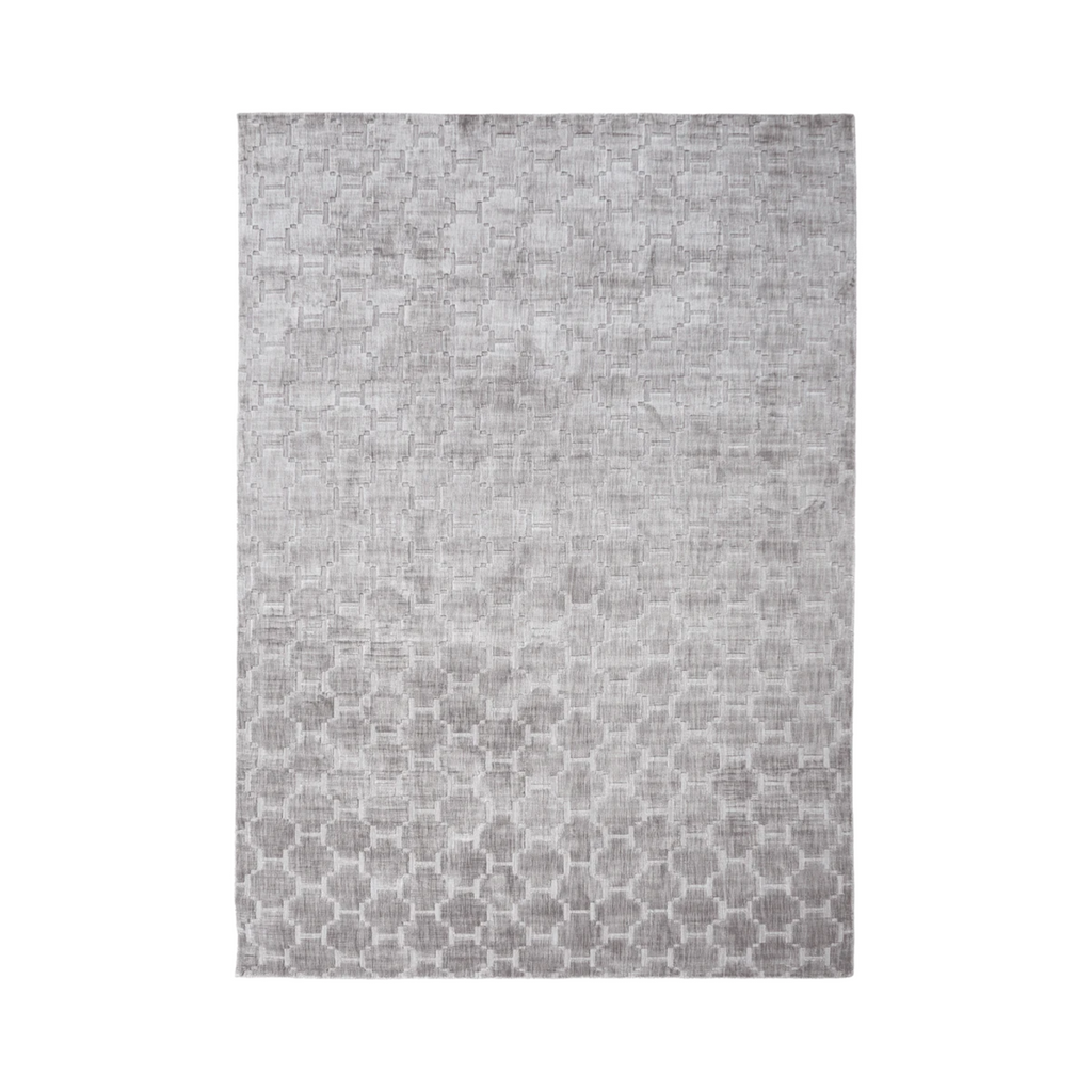 The Sanctuary rug from Tribe Home, adds a sense of elegance, neutrality and balance. Handmade with 100% silk and a motif design in shades of grey.