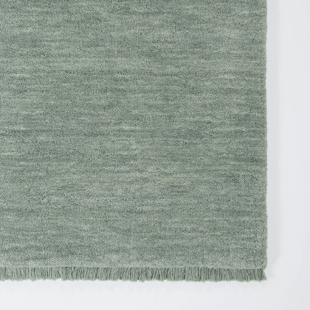 Baya Living Sandringham rug in aquamarine - corner detail and texture view