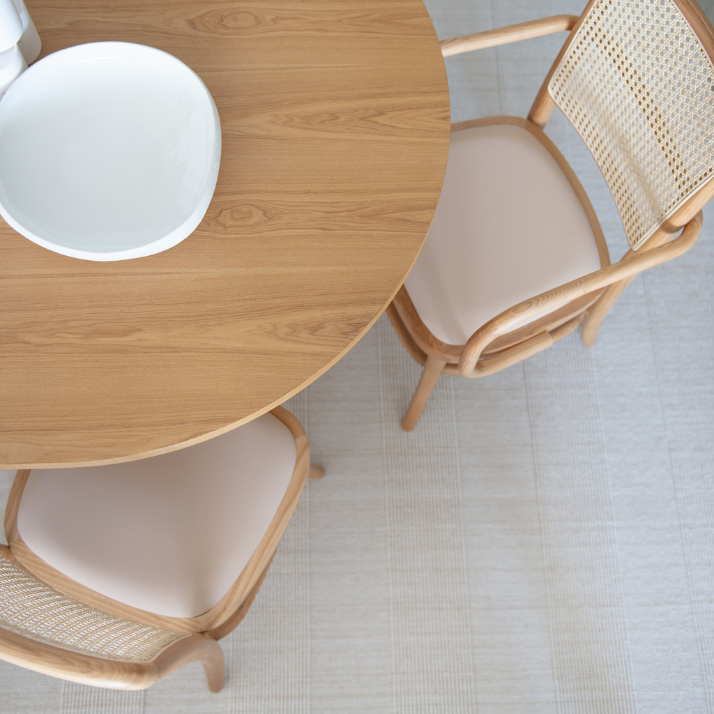 rattan and blush leather dining chair