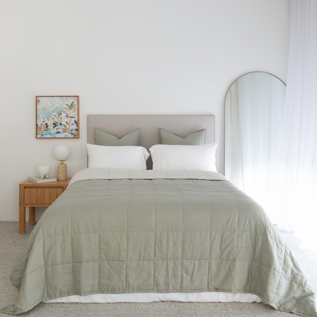 Sage green quilted linen bed throw