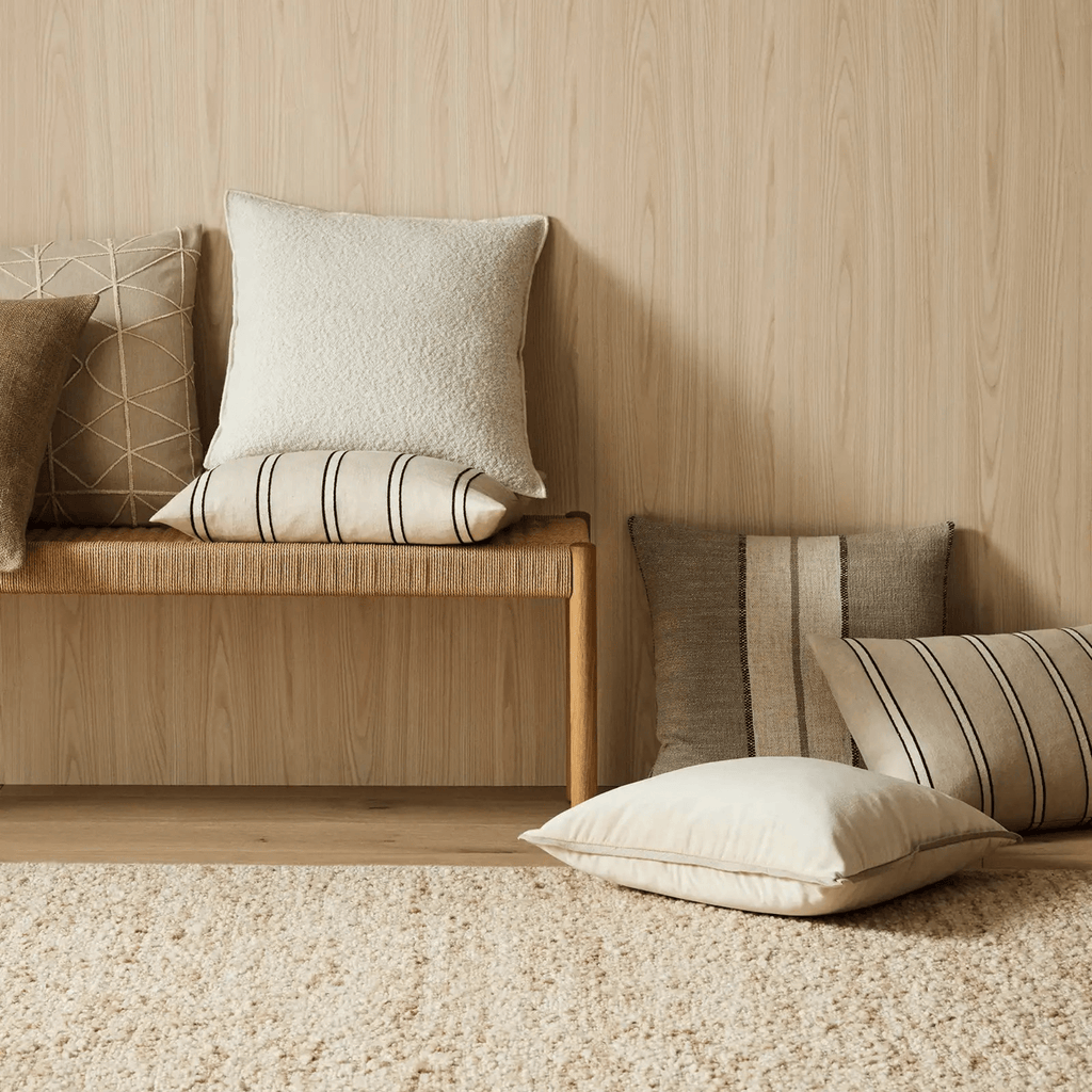 Weave Home Francesca Salt velvet cushion styled on bench, featuring warm neutral tones and rich plush texture