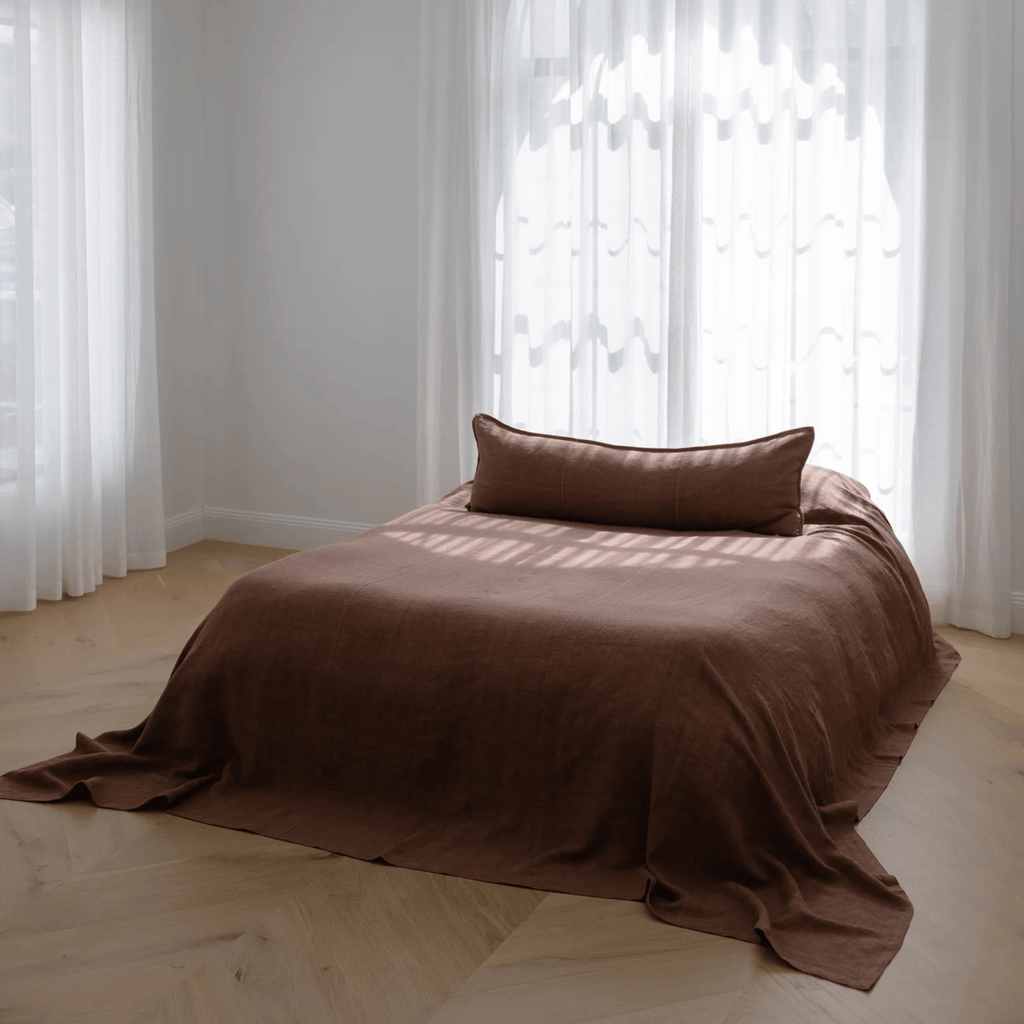 Eadie Luca Linen Bed Cover Clay styled on queen bed earthy tone relaxed elegant bedroom