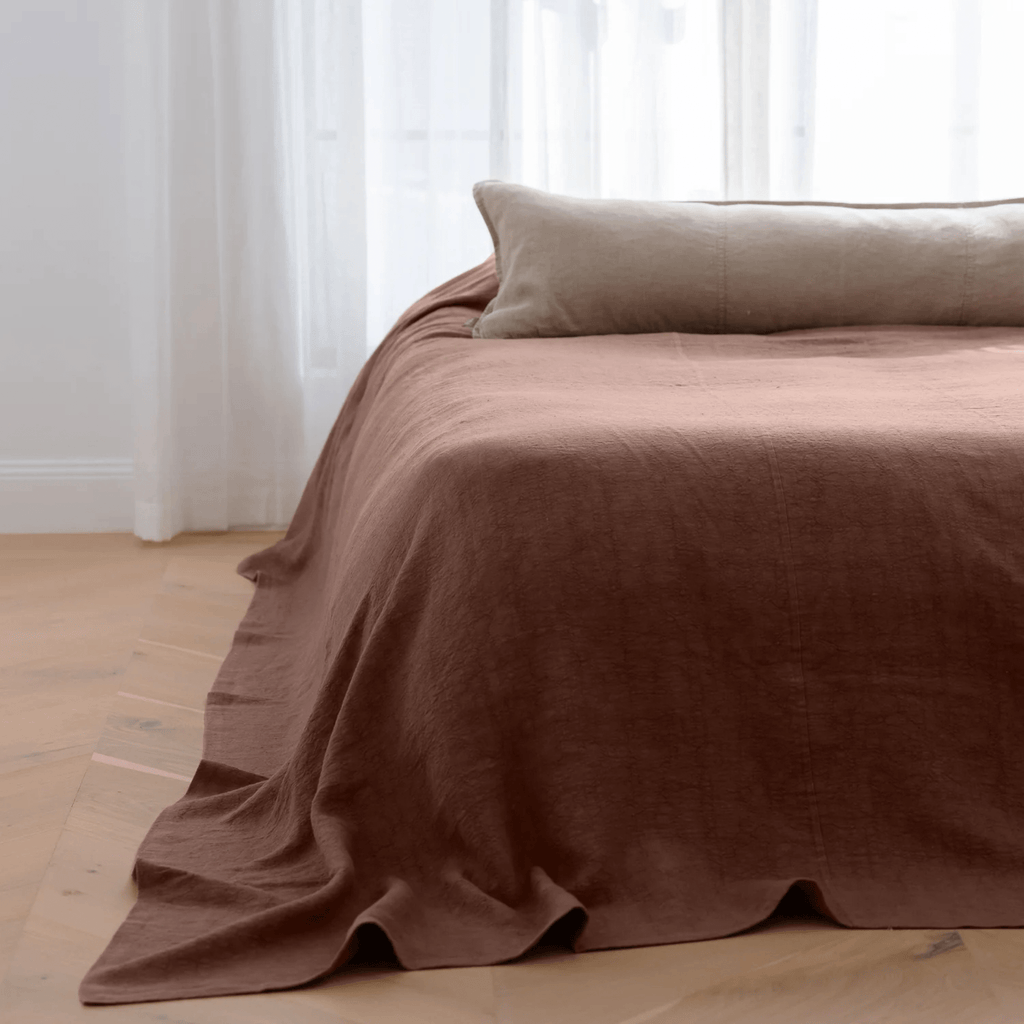 Eadie Luca Linen Bed Cover Clay close-up of garment-dyed linen texture and signature seams