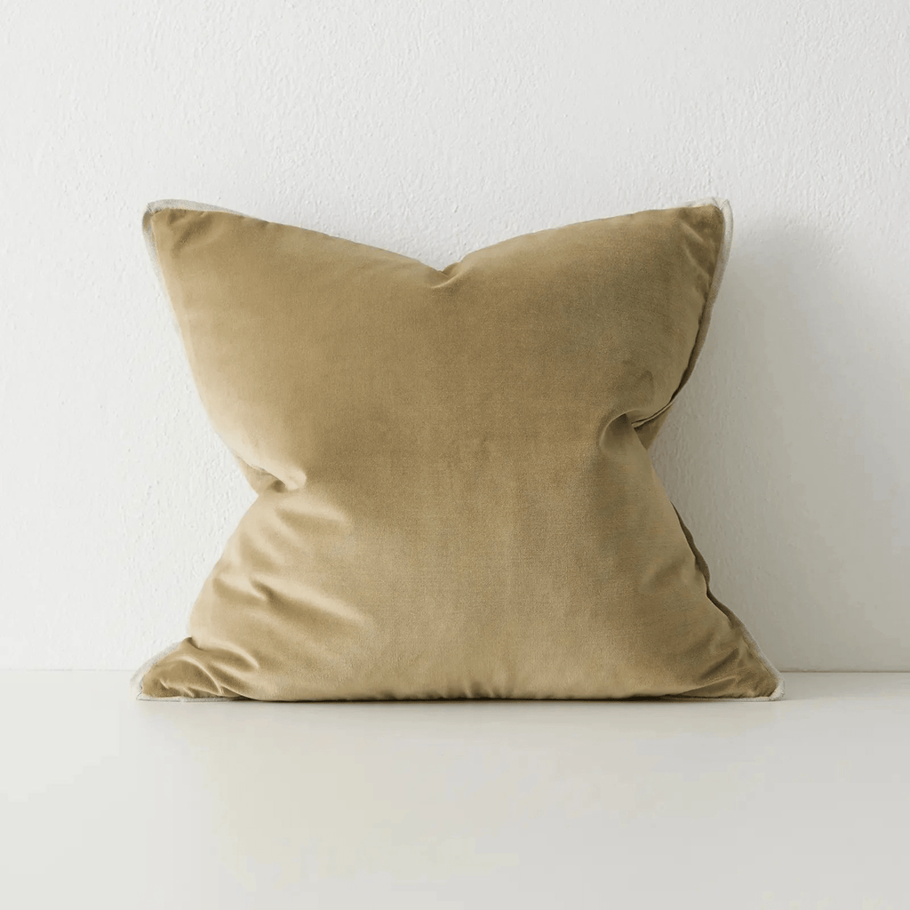 Francesca Olive velvet cushion by Weave Home on white background, showcasing soft plush texture and linen micro-flange.
