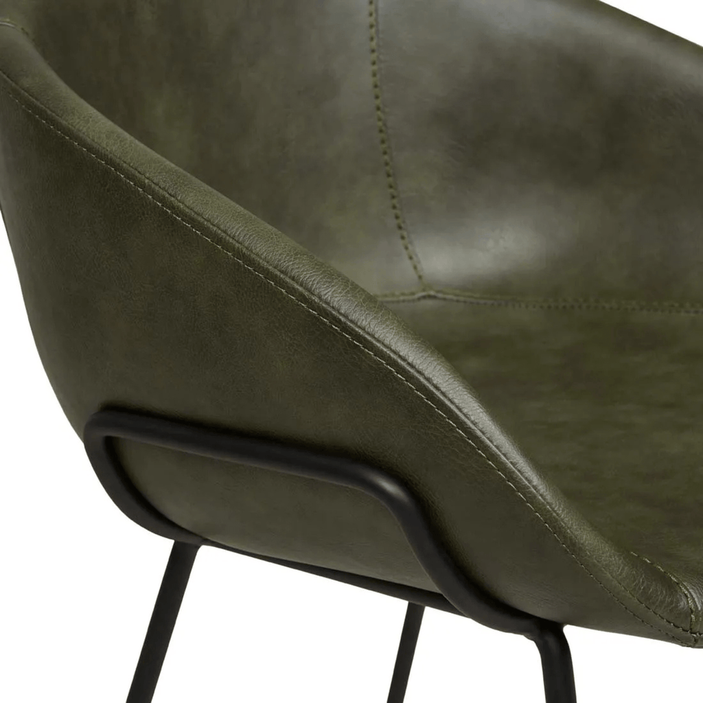 Close-up of Duke Barstool’s vintage green PU fabric, showcasing fine stitching, subtle texture, and durable upholstery finish.
