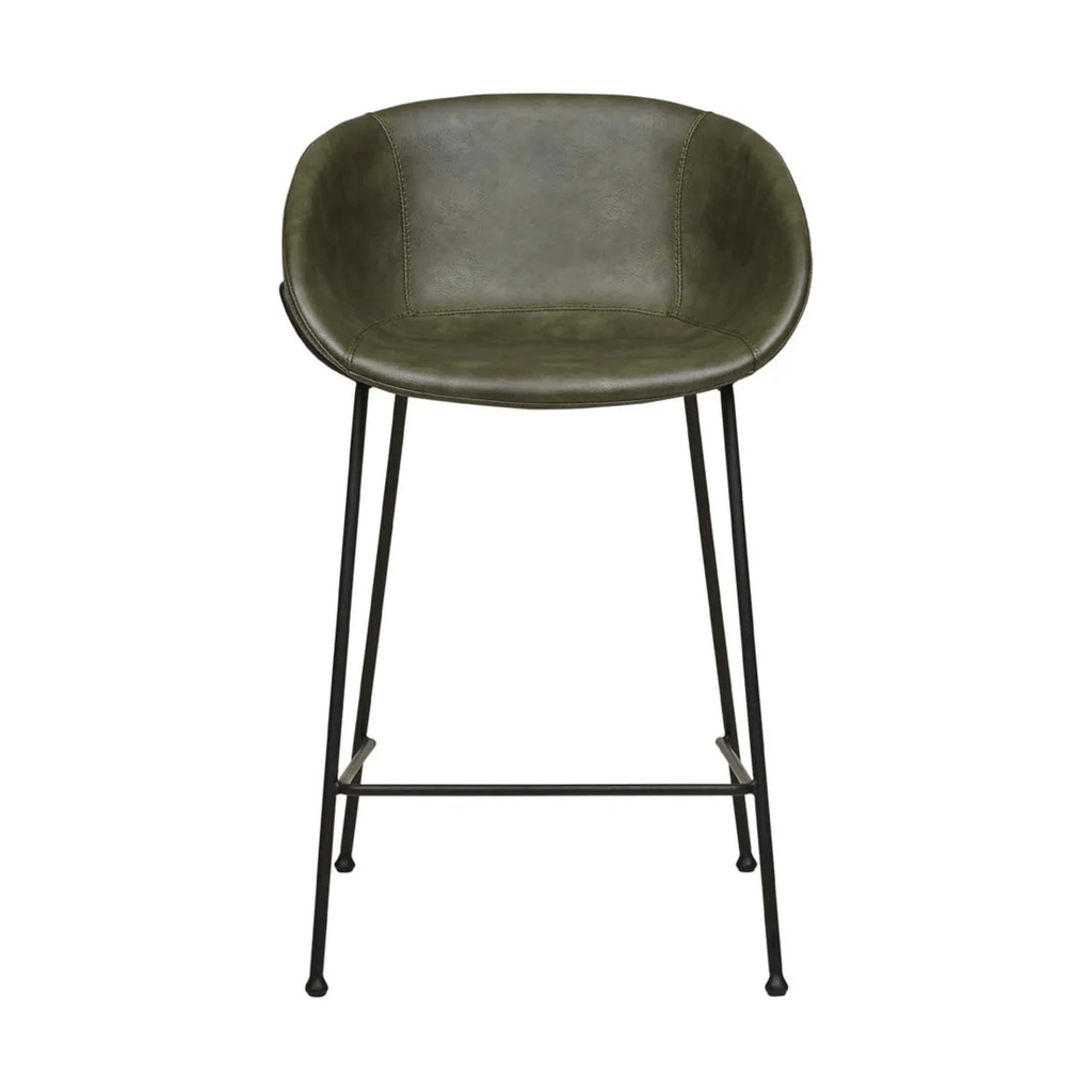 Front view of the Duke Barstool featuring vintage matt green PU upholstery and slim black metal legs, showcasing its modern industrial design.
