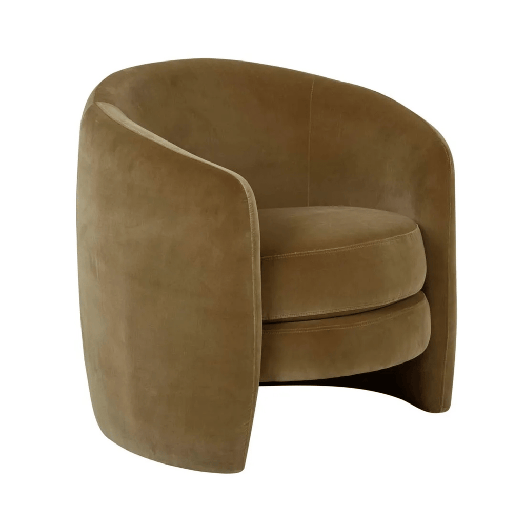 Side profile of the Kennedy Tenner chair with barrel-shaped silhouette and modern base in soft moss velvet upholstery.