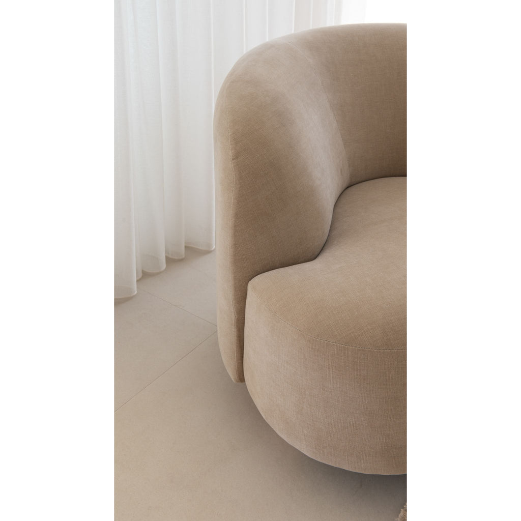 close up of Custom Made in WA, curved designer armchair by perth brand Granite Lane in Warwick Akoya Bone fabric