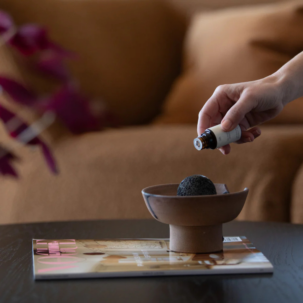 Studio McKenna Obsidian Diffuser clay finish displayed on table highlighting natural earthy tones and volcanic rock