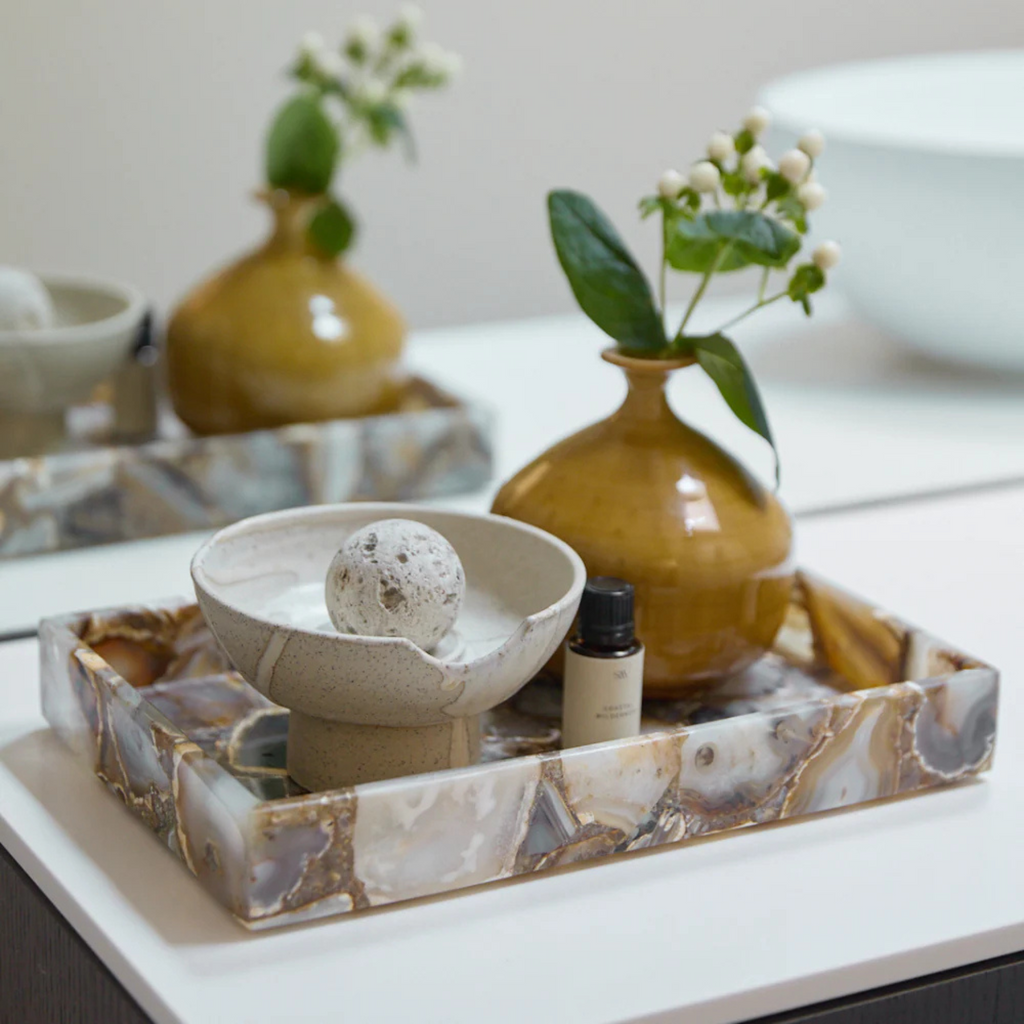 Studio McKenna Obsidian Diffuser cream finish styled on tray in modern home setting